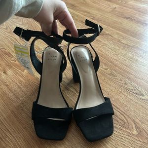 Brand new 8.5 black straps heels